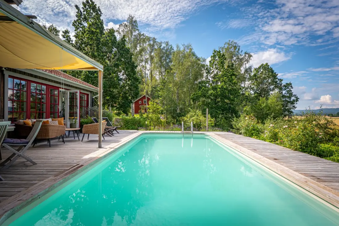 
extended-70s-house-swimming-pool-outdoor-stage-west-sweden-nordbu